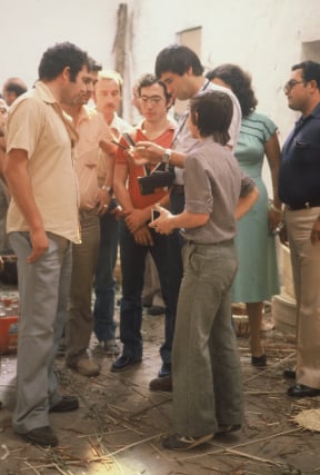 young Allan H Palecek talking with a small group